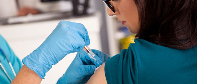 Woman getting flu shot